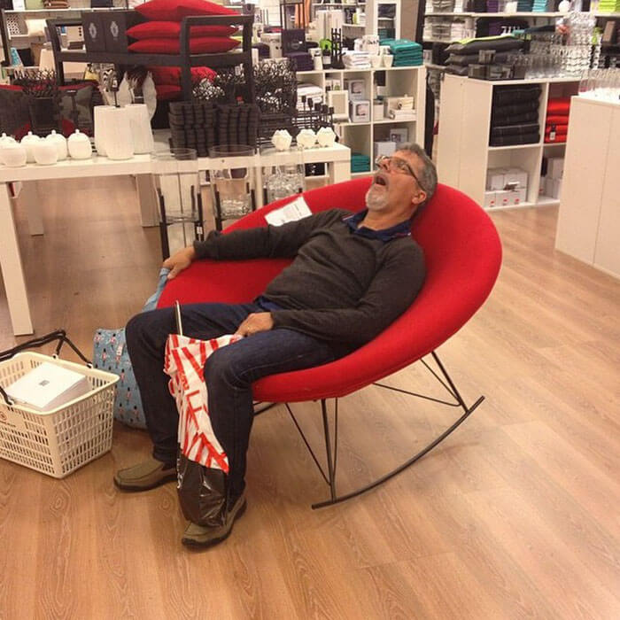 50 Hilarious Pictures Of 'Miserable Men' Waiting While Their Wives Were Shopping 13