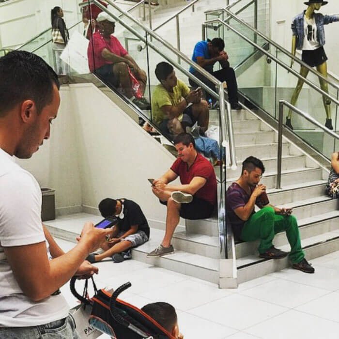 50 Hilarious Pictures Of 'Miserable Men' Waiting While Their Wives Were Shopping 16