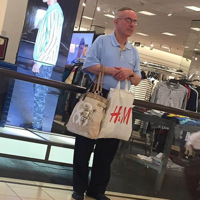 50 Hilarious Pictures Of 'Miserable Men' Waiting While Their Wives Were Shopping 17