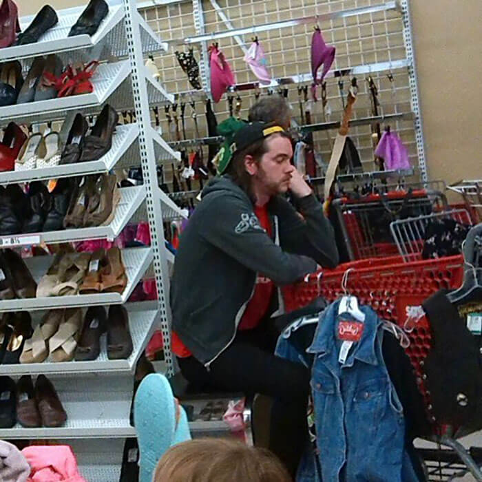 50 Hilarious Pictures Of 'Miserable Men' Waiting While Their Wives Were Shopping 35