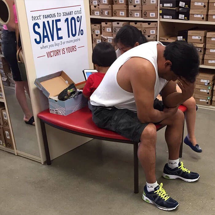 50 Hilarious Pictures Of 'Miserable Men' Waiting While Their Wives Were Shopping 36