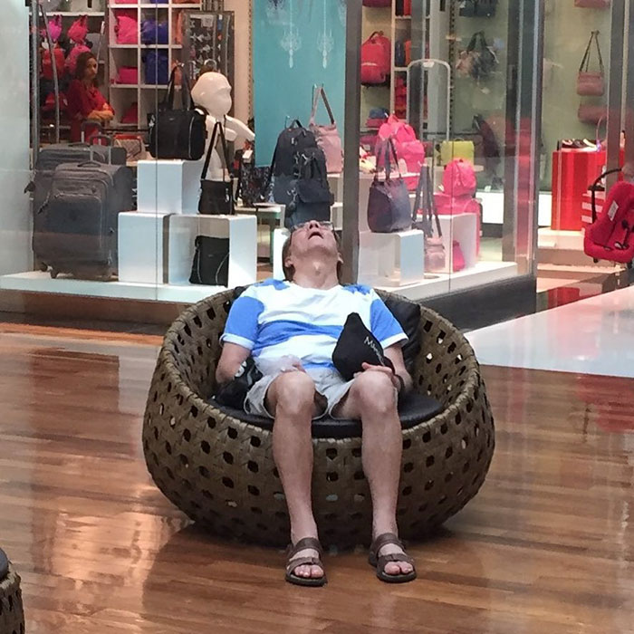 50 Hilarious Pictures Of 'Miserable Men' Waiting While Their Wives Were Shopping 42