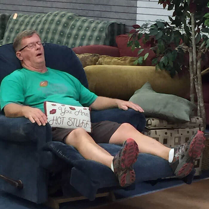 50 Hilarious Pictures Of 'Miserable Men' Waiting While Their Wives Were Shopping 8