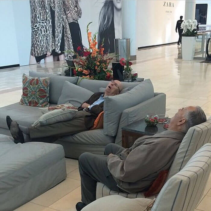 50 Hilarious Pictures Of 'Miserable Men' Waiting While Their Wives Were Shopping 2