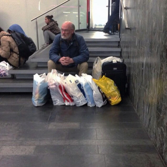 50 Hilarious Pictures Of 'Miserable Men' Waiting While Their Wives Were Shopping 26