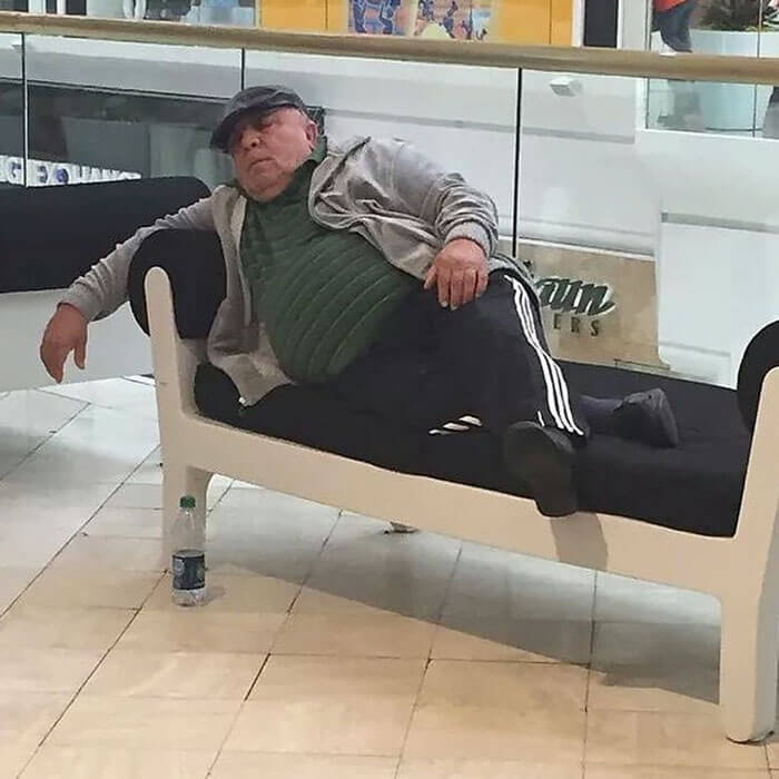 50 Hilarious Pictures Of 'Miserable Men' Waiting While Their Wives Were Shopping 28