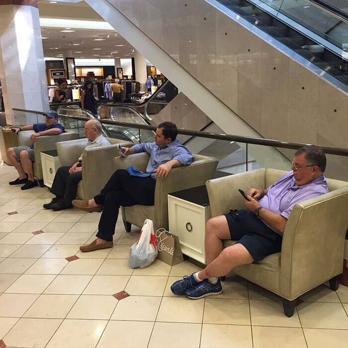 50 Hilarious Pictures Of 'Miserable Men' Waiting While Their Wives Were Shopping 37