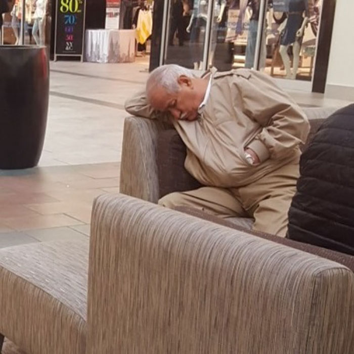 50 Hilarious Pictures Of 'Miserable Men' Waiting While Their Wives Were Shopping 46