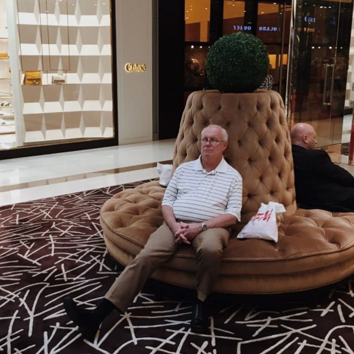 50 Hilarious Pictures Of 'Miserable Men' Waiting While Their Wives Were Shopping 50