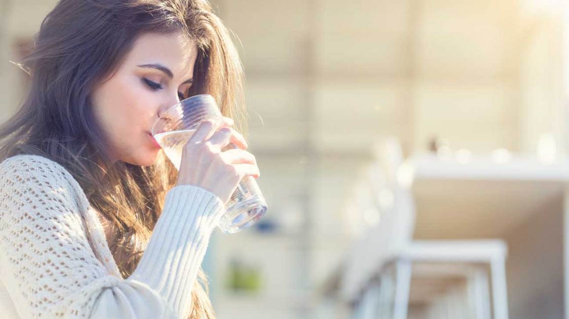 Woman Drinking Water 1296x728