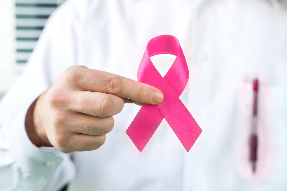 Doctor Holding Breast Cancer Awareness Ribbon