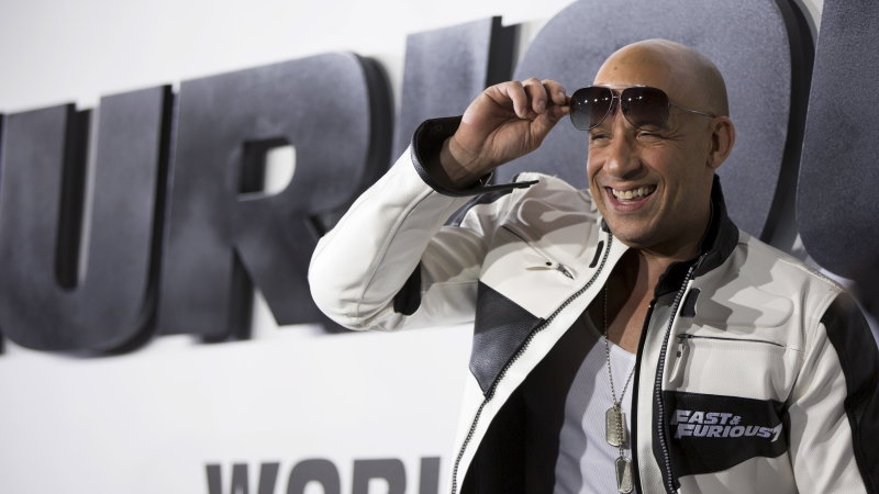 Cast Member Diesel Poses At Fans At The Premiere Of "Furious 7" At The TCL Chinese Theatre In Hollywood
