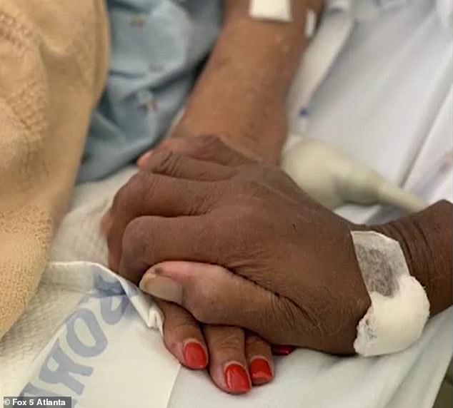 27086878 8211335 The_elderly_couple_were_seen_holding_hands_while_at_the_hospital M 19_1586661963129