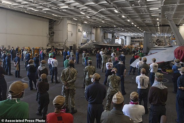 27105184 8212381 In_this_photo_taken_April_7_2020_provided_by_the_U_S_Navy_sailor A 3_1586716491770