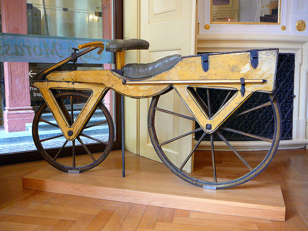 1024px Draisine_or_Laufmaschine,_around_1820._Archetype_of_the_Bicycle._Pic_01