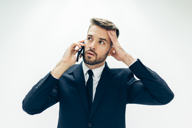Handsome Business Guy With Mobile Phone Worried_23 2147580190