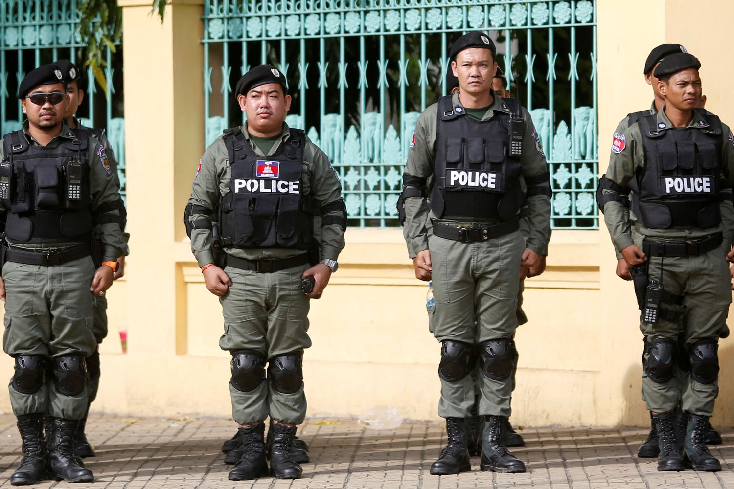 FILE PHOTO: Police Officers Stand Guard Near The Supreme Court Of Phnom Penh