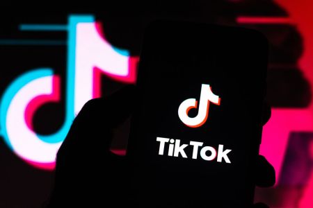 In This Photo Illustration A TikTok Logo Seen Displayed On A