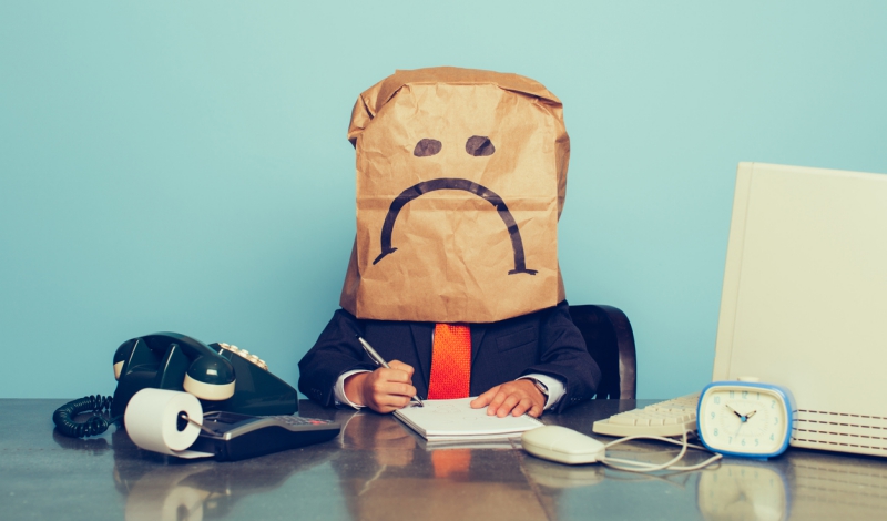 Young Boy Businessman Wears Sad Face