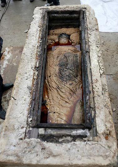 Mummy In Brown Liquid