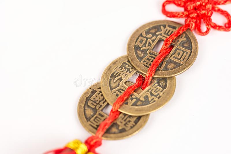 Three Ancient Feng Shui Metal Lucky Coins Isolated Above White B Three Ancient Feng Shui Metal Lucky Coins Isolated Above White 102377947