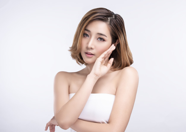 Beauty Young Asian Woman With Perfect Facial Skin. Gestures For