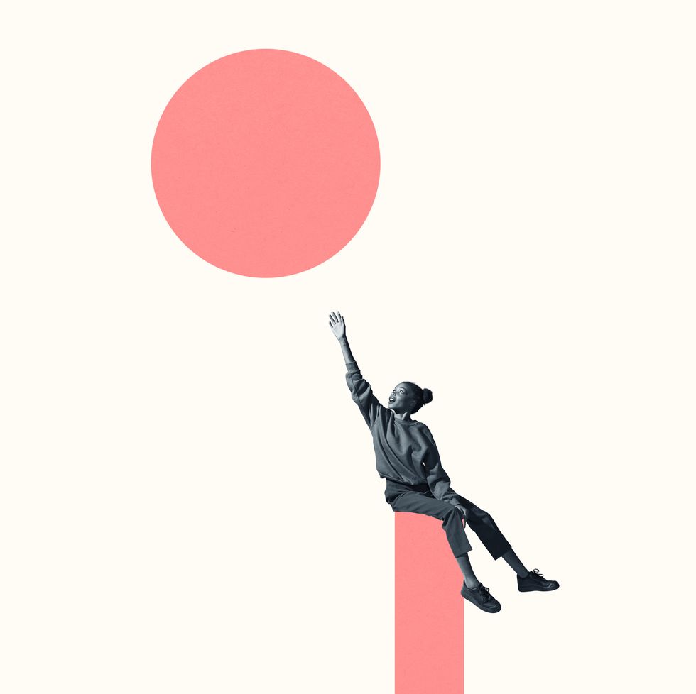 Woman Sitting On Column While Reaching For Circle Royalty Free Image 1616638323