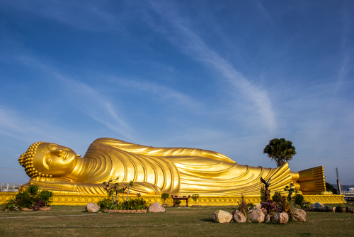 Reclining,Buddha,Gold,Statue,Face,At,Bangkok,,Thailand