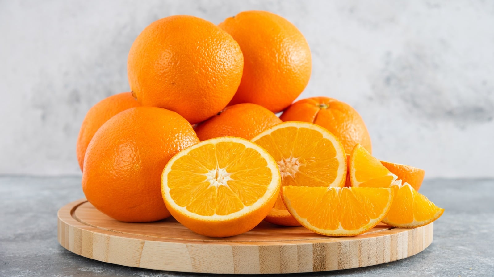 Front,View,Fresh,Sliced,Orange,On,Dark,Background,Ripe,Mellow