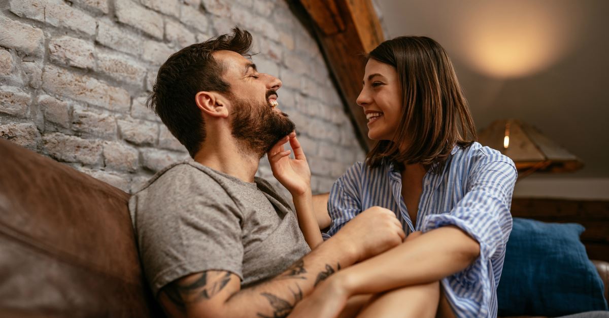 651 69299 Couple On Couch Gettyimages Bernardbodo